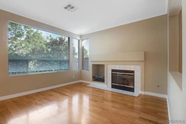 a kitchen with a refrigerator sink and microwave