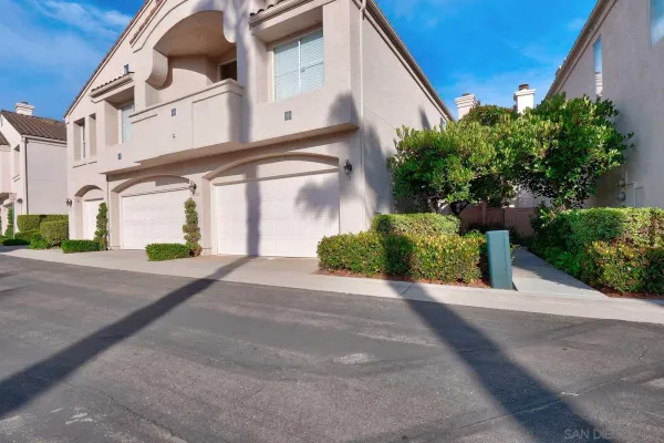 a bathroom with a toilet a sink and a window