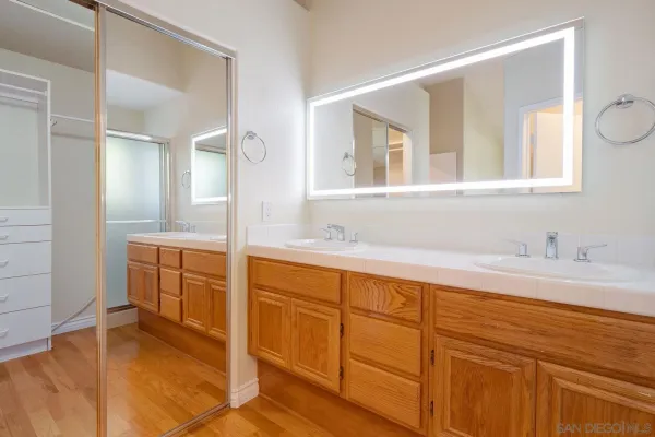 a view of a room with furniture and floor to ceiling window