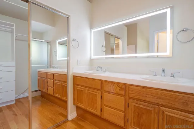 a view of a room with furniture and floor to ceiling window