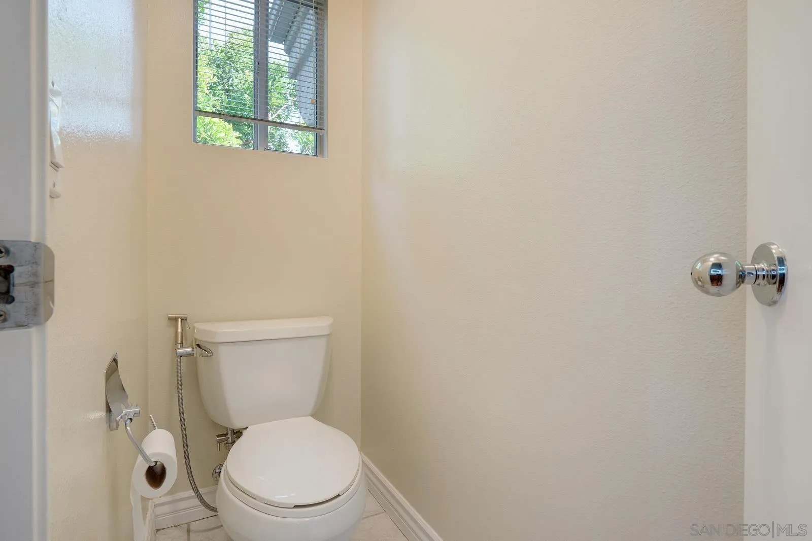 5512 Renaissance Avenue, Unit 3 San Diego, CA 92122 - Photo 36 of 57 a white toilet sitting next to a shower