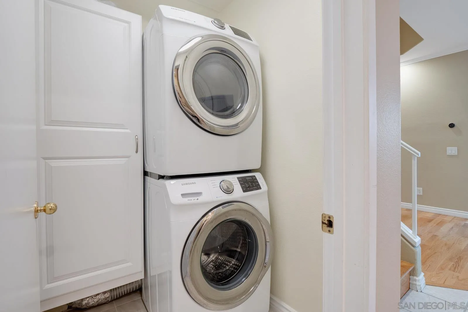 5512 Renaissance Avenue, Unit 3 San Diego, CA 92122 - Photo 38 of 57 a utility room with dryer and washer