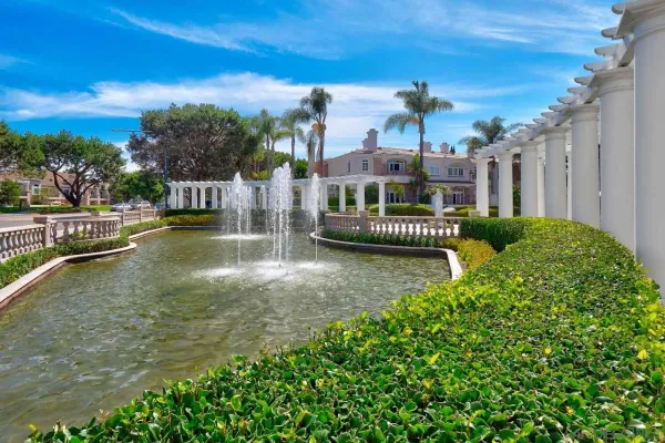 a view of a lake with a house in the background