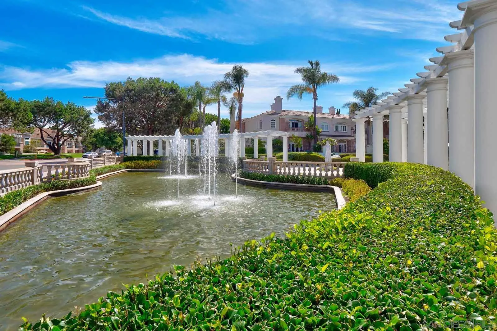 5512 Renaissance Avenue, Unit 3 San Diego, CA 92122 - Photo 48 of 57 a view of a house with a yard and sitting area