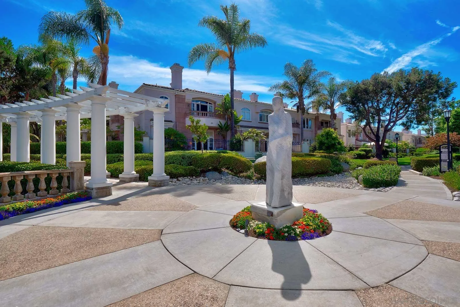 5512 Renaissance Avenue, Unit 3 San Diego, CA 92122 - Photo 49 of 57 a view of a building with garden in front of it