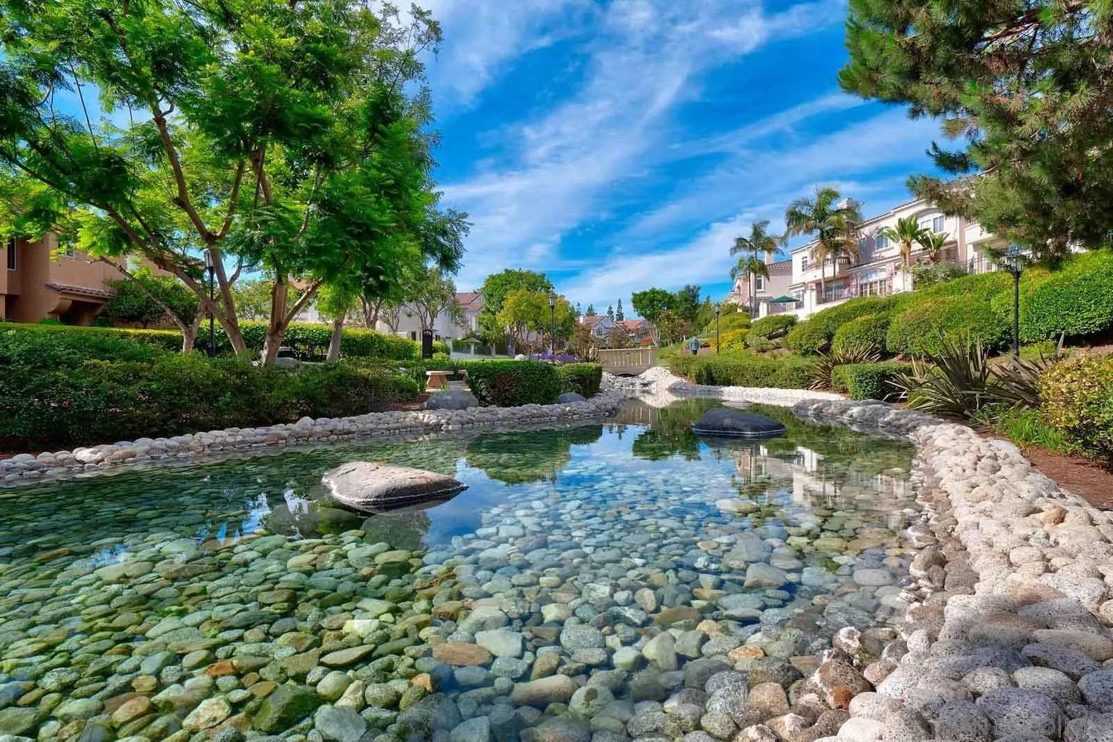 5512 Renaissance Avenue, Unit 3 San Diego, CA 92122 - Photo 56 of 57 a view of a water pond with a yard