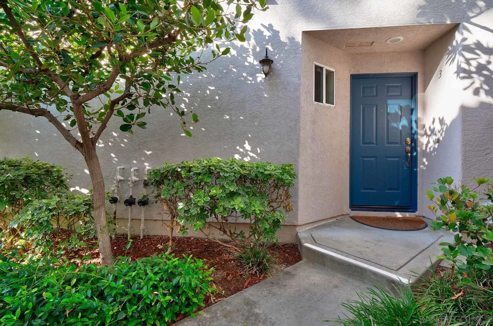 5512 Renaissance Avenue, Unit 3 San Diego, CA 92122 - Photo 6 of 57 a view of house with backyard and garden