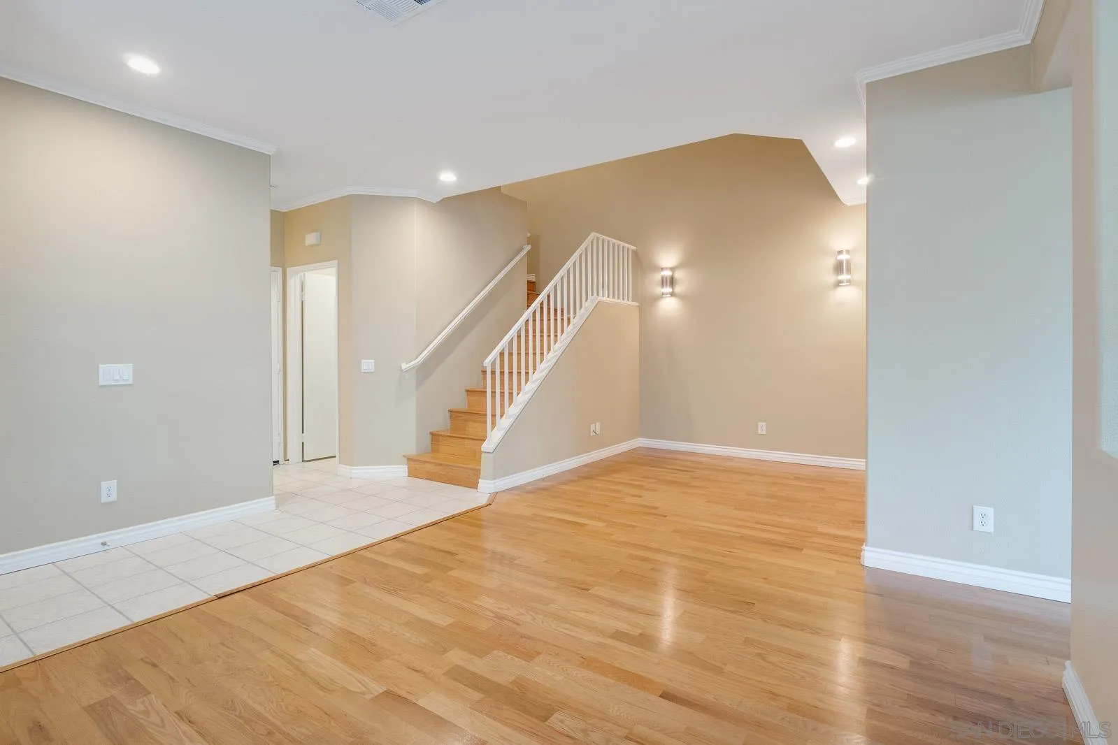 5512 Renaissance Avenue, Unit 3 San Diego, CA 92122 - Photo 8 of 57 a view of an empty room with wooden floor