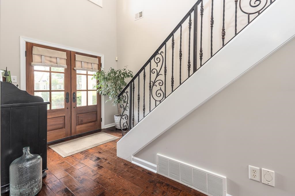 1725 John Ridge Drive Collierville, TN 38017 - Photo 2 of 34 a view of entryway and hall with wooden floor
