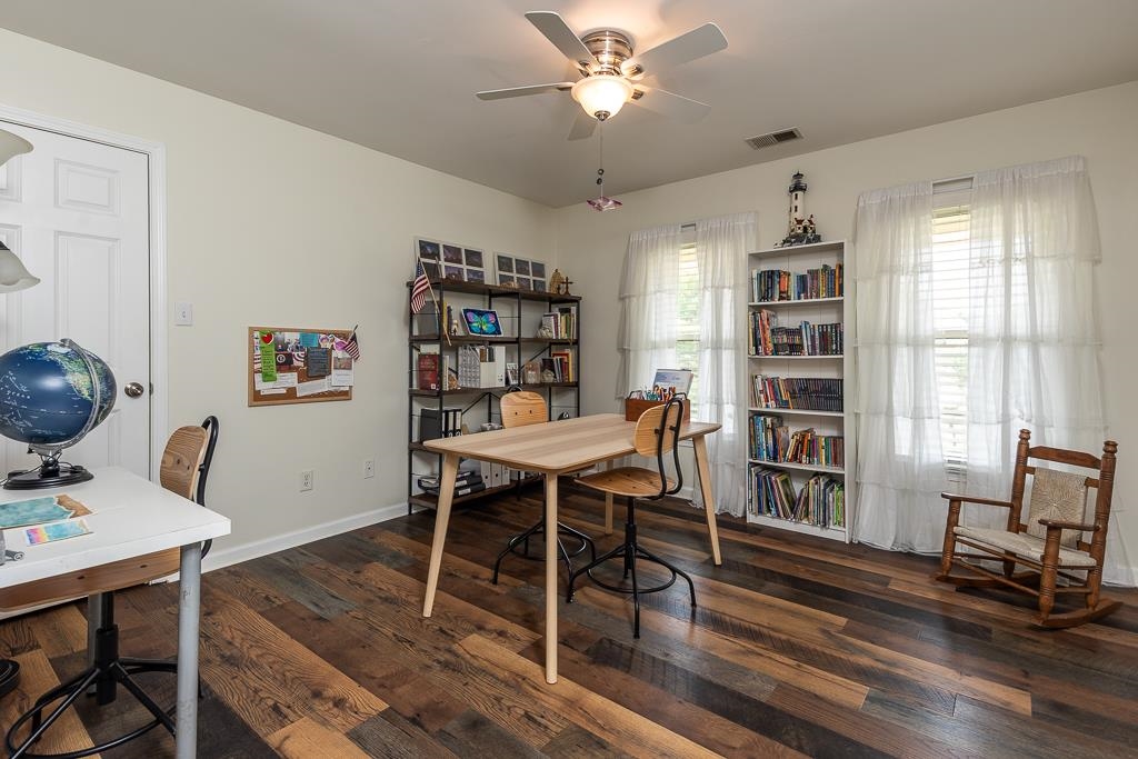 1725 John Ridge Drive Collierville, TN 38017 - Photo 26 of 34 a view of a workspace with furniture and a bookshelf