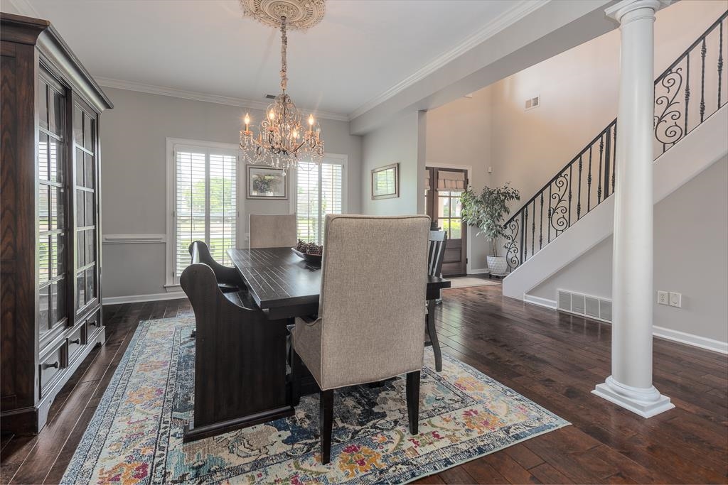 1725 John Ridge Drive Collierville, TN 38017 - Photo 8 of 34 a view of a livingroom with furniture window and wooden floor