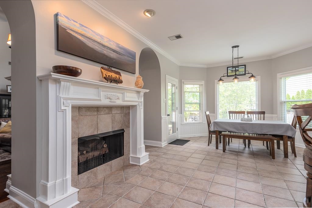 1725 John Ridge Drive Collierville, TN 38017 - Photo 10 of 34 a dining room with furniture window and fireplace