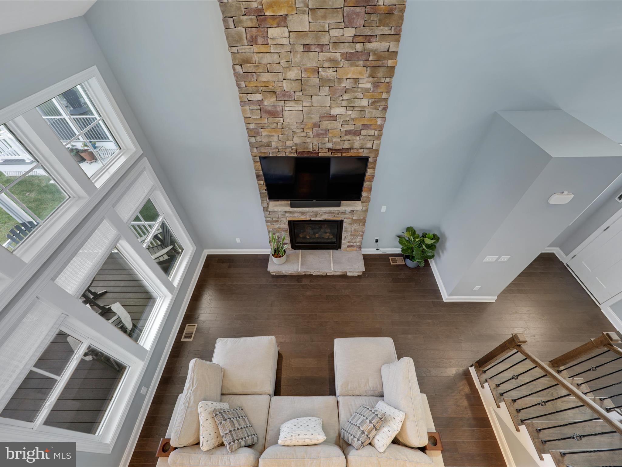 11893 Haslet Road Lewes, DE 19958 - Photo 17 of 59 Gas Fireplace with Stone Surround