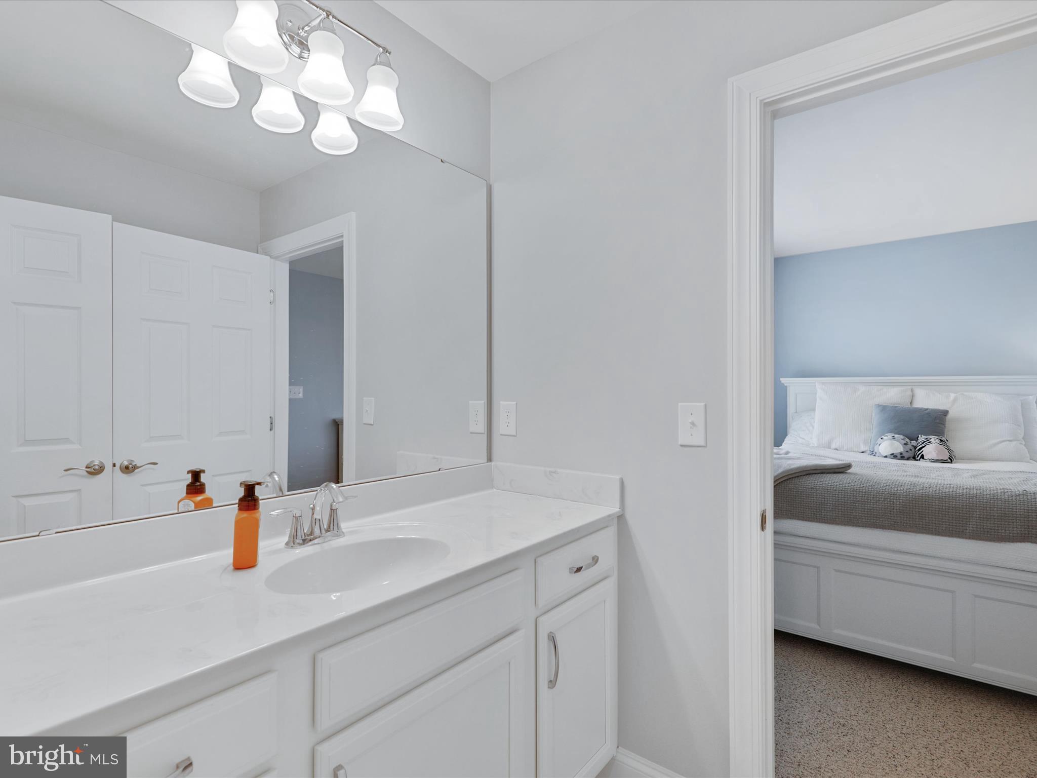 11893 Haslet Road Lewes, DE 19958 - Photo 26 of 59 Jack & Jill bath between Bed 2 & Bed 3