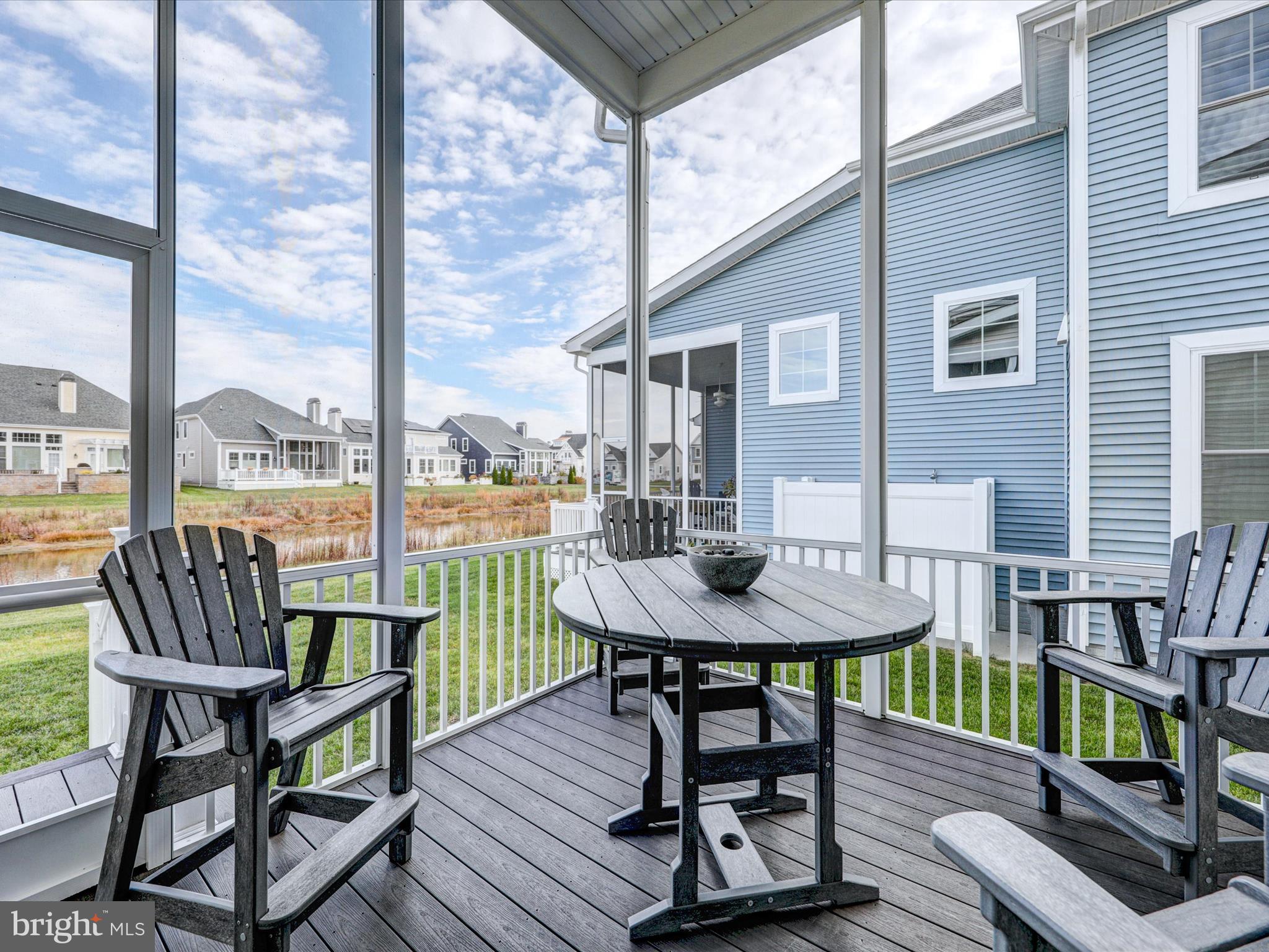 11893 Haslet Road Lewes, DE 19958 - Photo 44 of 59 Rear Screened Porch overlooking decorative pond
