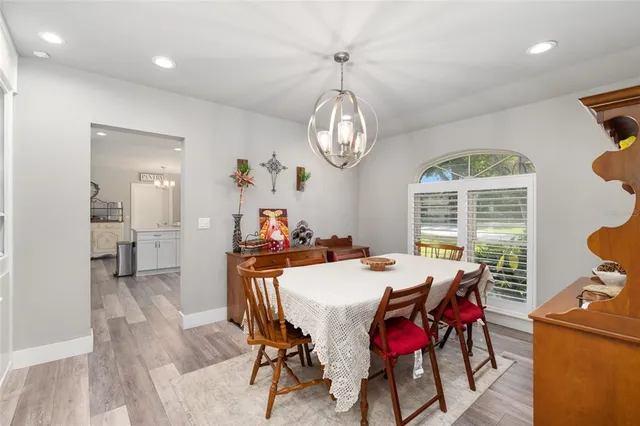 a kitchen with stainless steel appliances a stove a microwave and cabinets