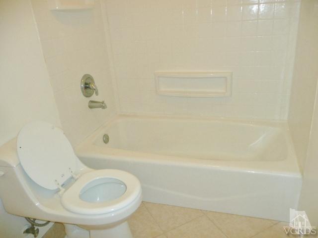 5332 Parkmor Road Calabasas, CA 91302 - Photo 10 of 10 a bathroom with a toilet and a bathtub