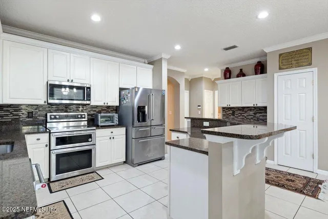 a living room with furniture or couch and a window