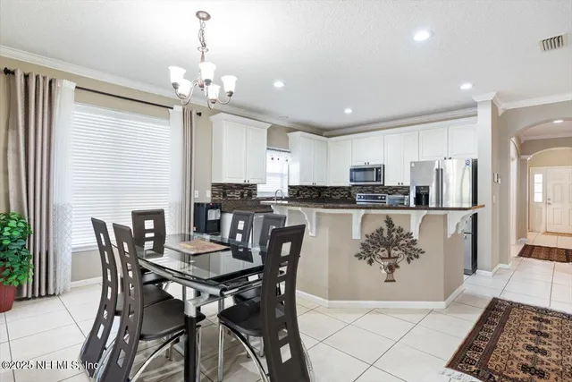 a view of a hallway view with wooden floor and staircase