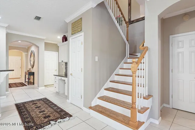 a bathroom with a sink double vanity granite toilet and shower