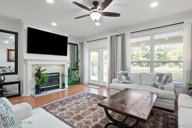 a view of a lake with houses in the background