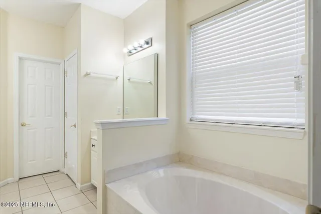 an aerial view of residential house with outdoor space and street view