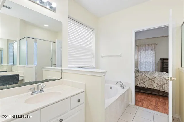 an aerial view of residential house with outdoor space and street view