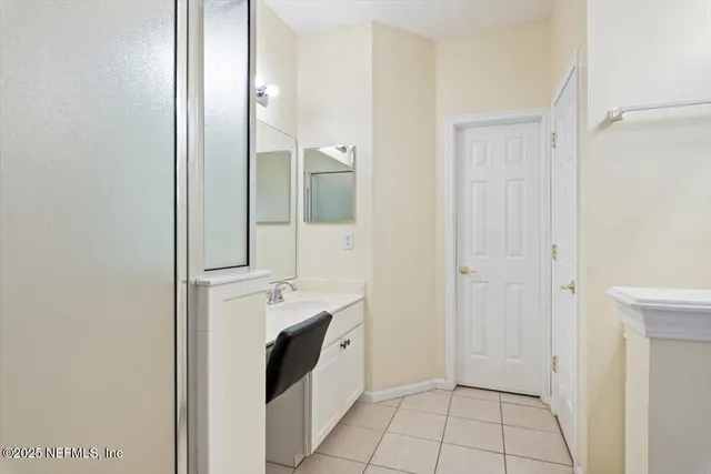 an aerial view of house with yard swimming pool and outdoor seating