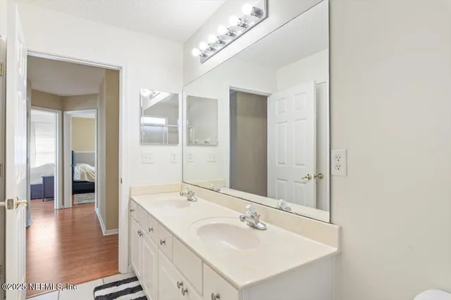 a view of a backyard with swimming pool