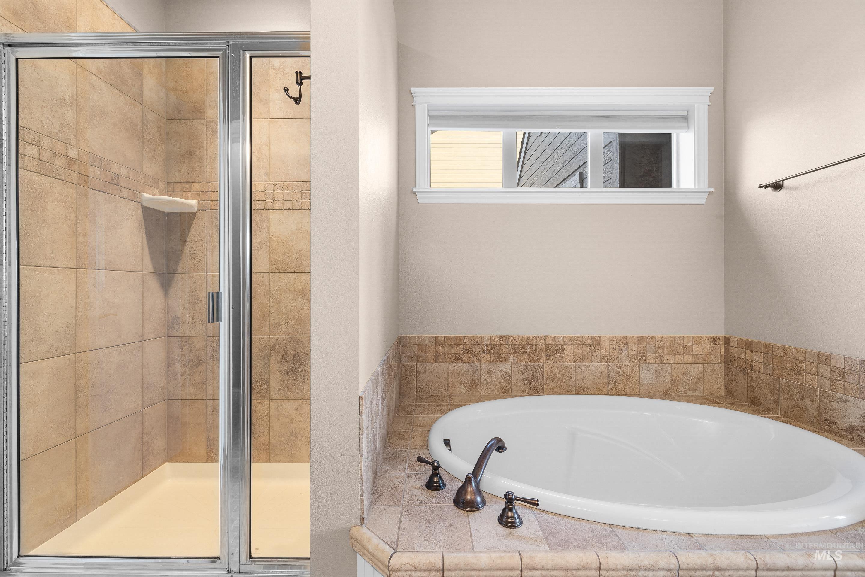 2208 East Sicily Street Meridian, ID 83642 - Photo 25 of 50 Full bath featuring a garden tub and a shower stall