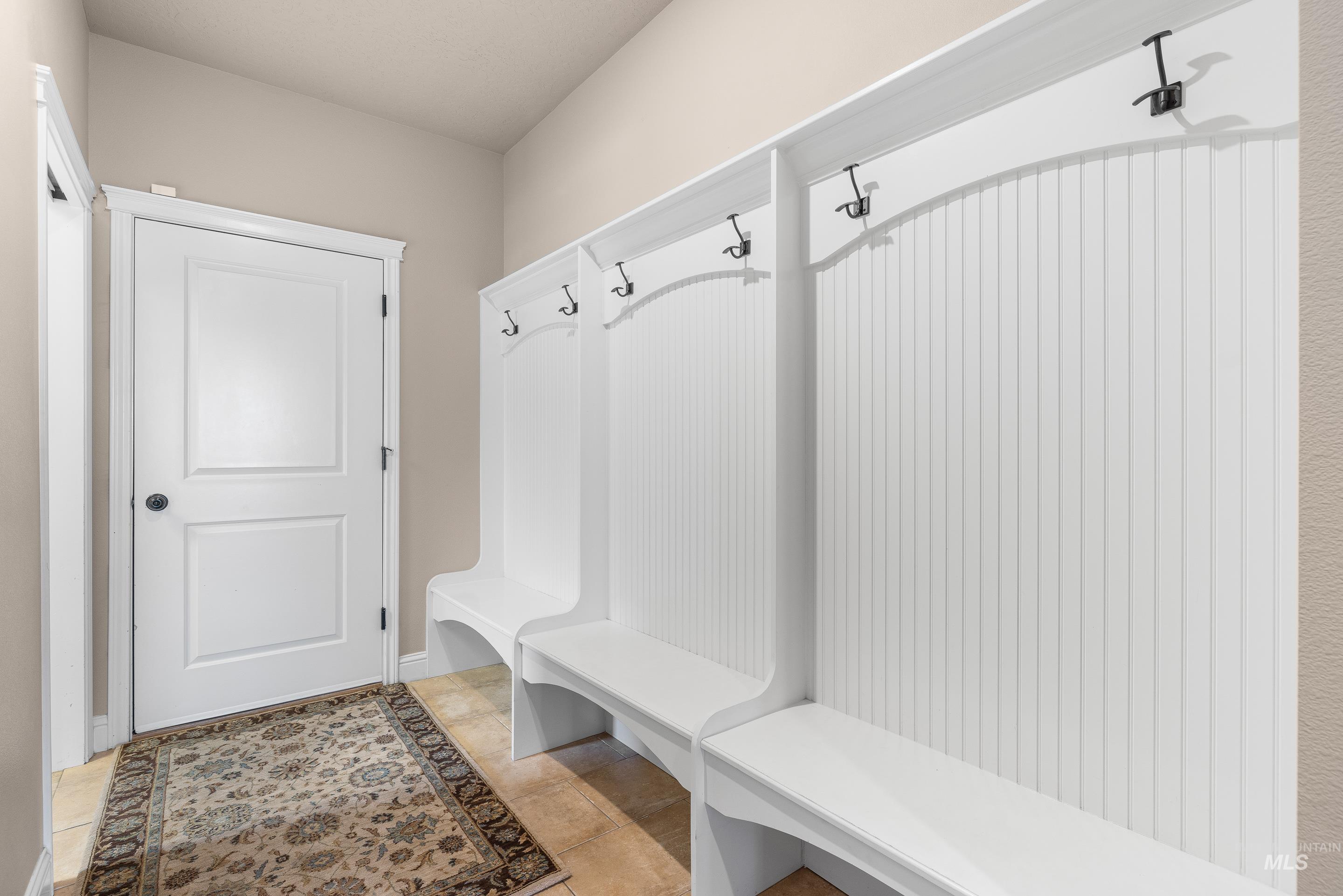 2208 East Sicily Street Meridian, ID 83642 - Photo 42 of 50 Mudroom featuring tile patterned flooring