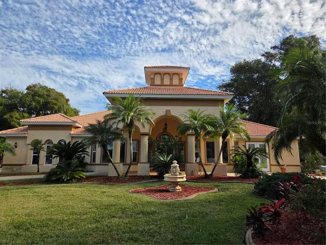 a view of a building with a swimming pool