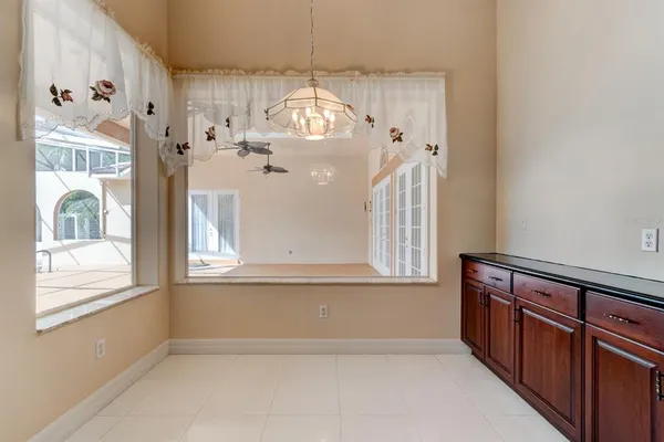a kitchen with stainless steel appliances wooden cabinets a sink and a counter top space