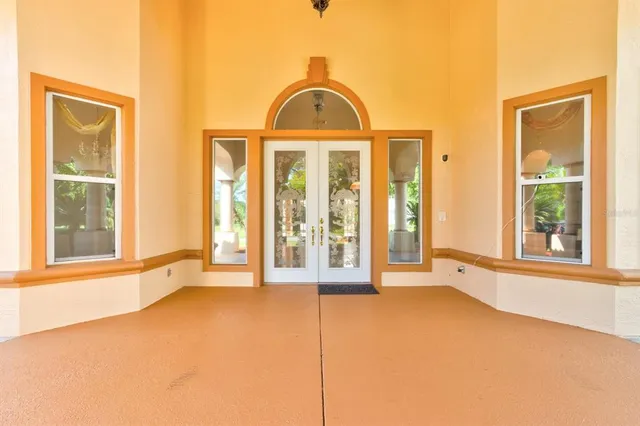 an empty room with windows