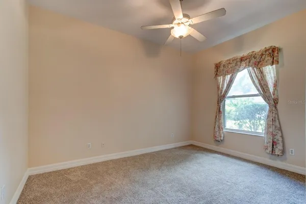 a view of swimming pool from a living room