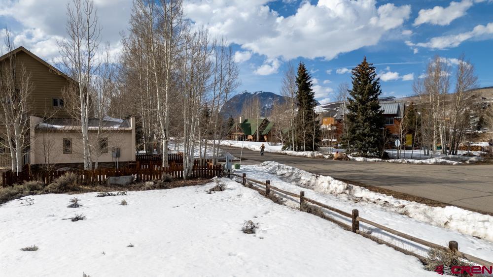 256 Shavano Street Crested Butte, CO 81224 - Photo 10 of 18 a view of city street with snow on the roadside