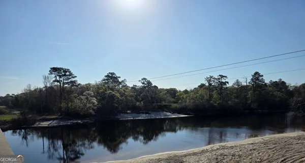 a view of a lake with a mountain