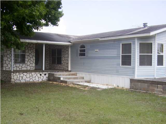 1209 Laird Road Crestview, FL 32539 - Photo 1 of 1 a view of house with a yard