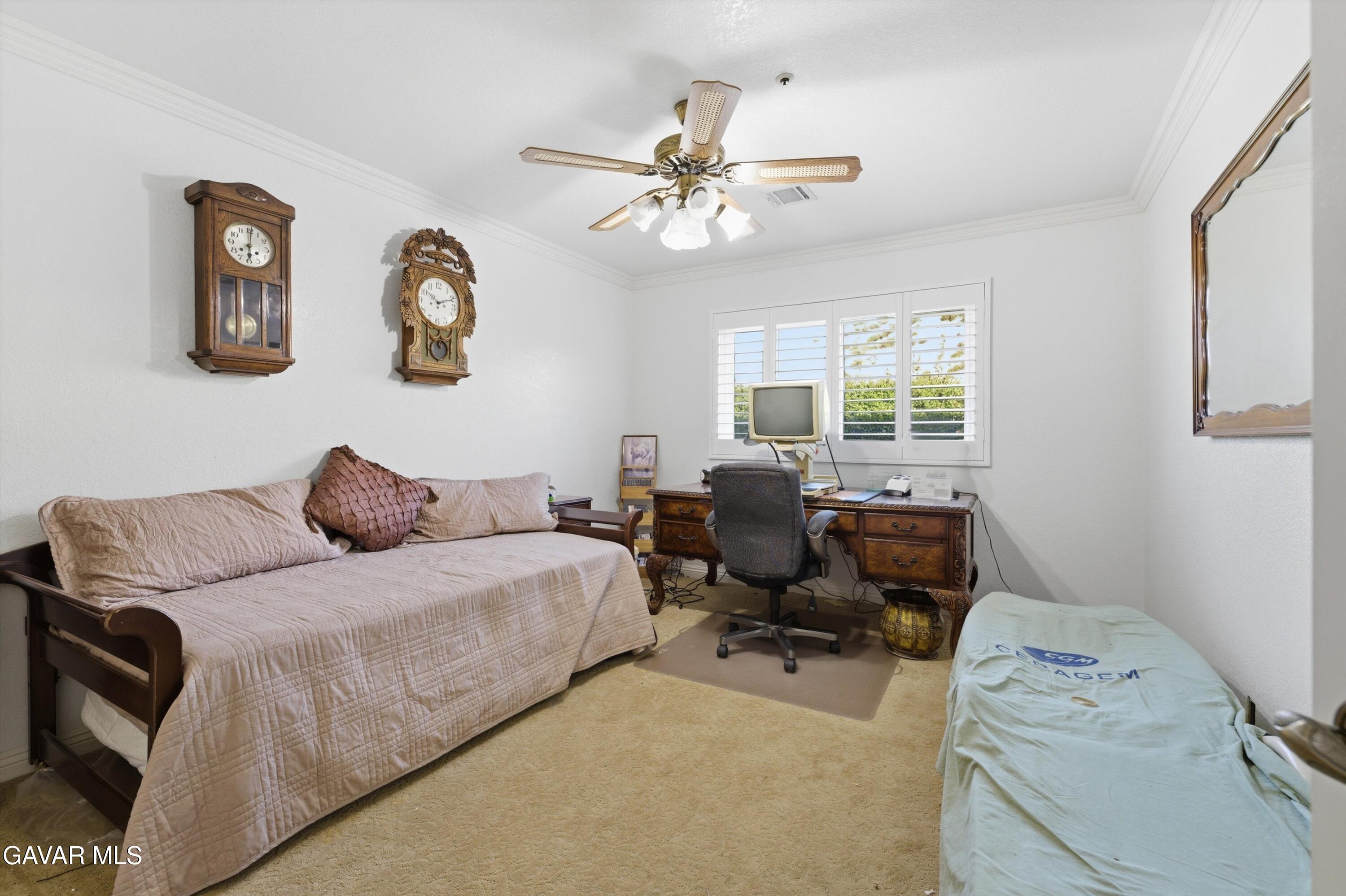 5801 Hacienda Ranch Road Palmdale, CA 93551 - Photo 33 of 69 a bedroom with a bed and wooden floor