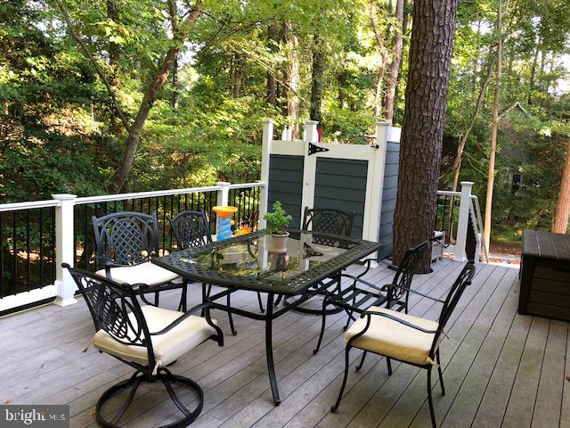360 Bay Reach Rehoboth Beach, DE 19971 - Photo 20 of 28 a view of a chairs and table in patio
