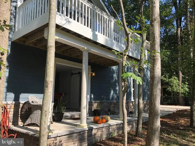 a view of a two chairs in the deck