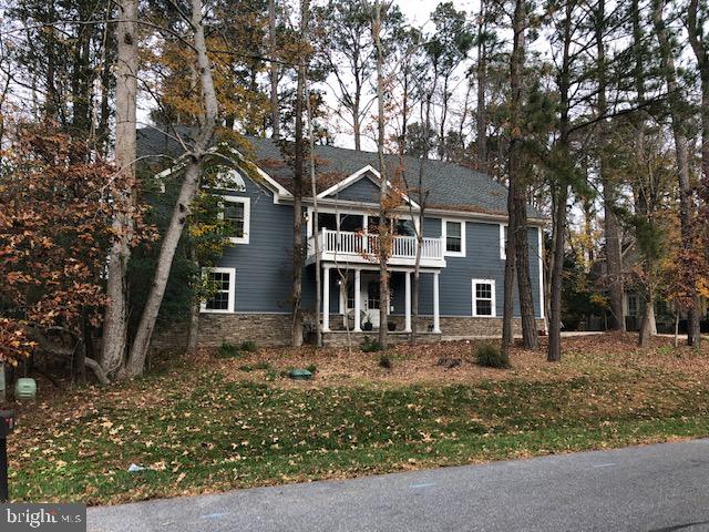 360 Bay Reach Rehoboth Beach, DE 19971 - Photo 28 of 28 front view of a house with a yard
