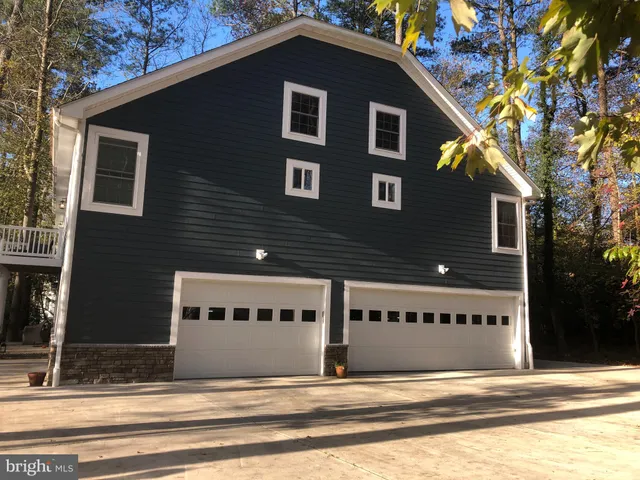 a view of a house with a house and a outdoor space