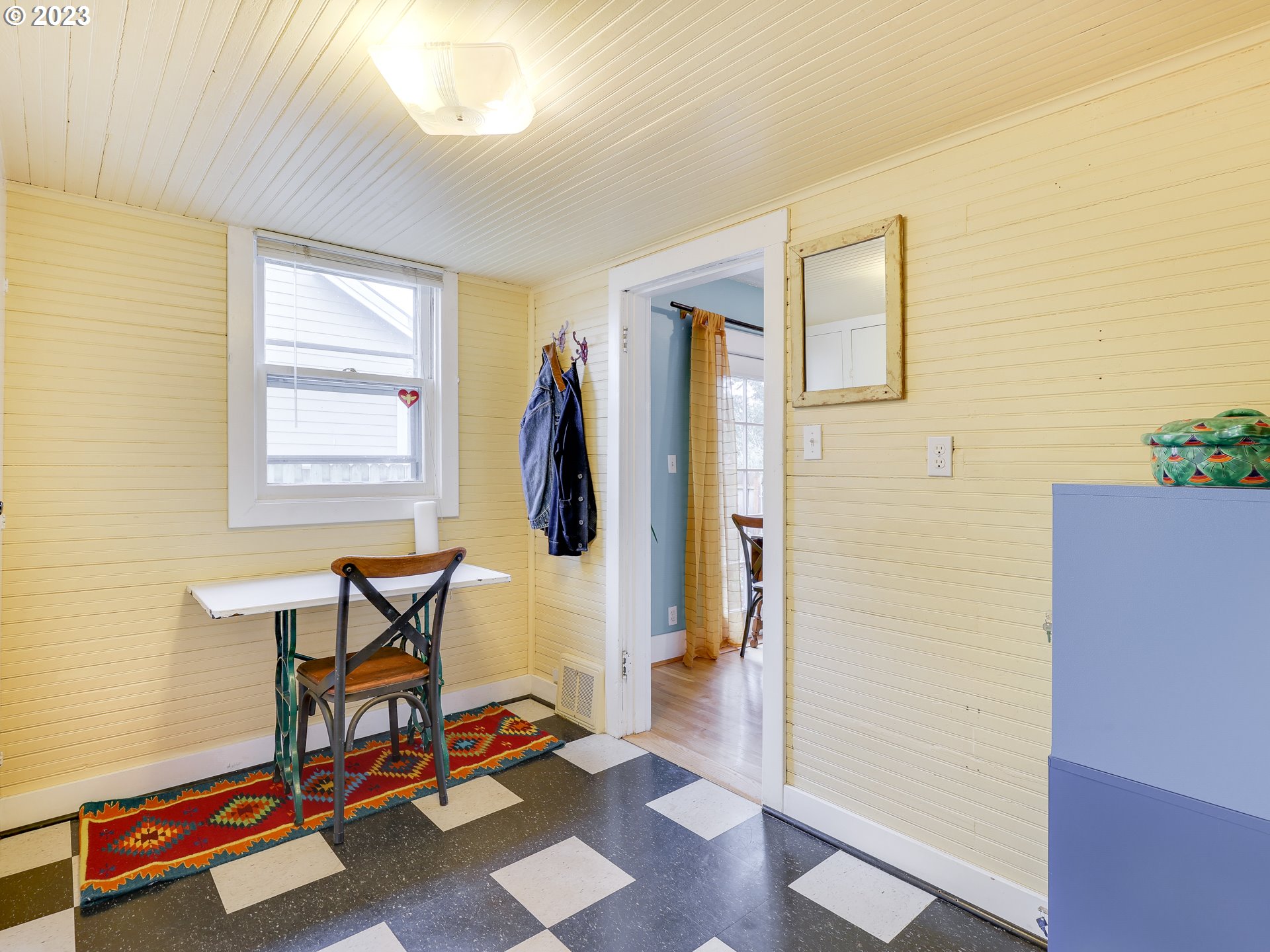 4936 Southeast 76th Avenue Portland, OR 97206 - Photo 20 of 47 a living room with furniture and a window