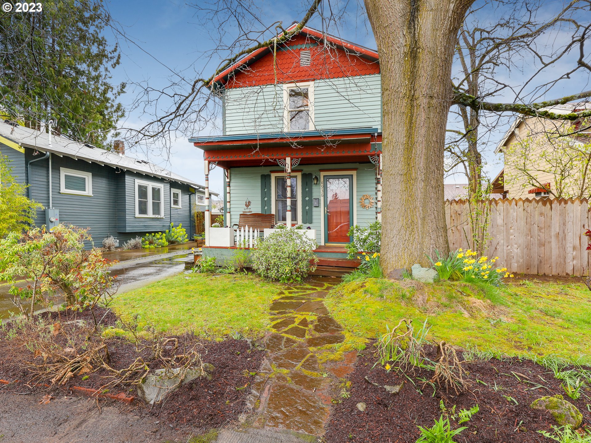 4936 Southeast 76th Avenue Portland, OR 97206 - Photo 2 of 47 a view of a house with swimming pool
