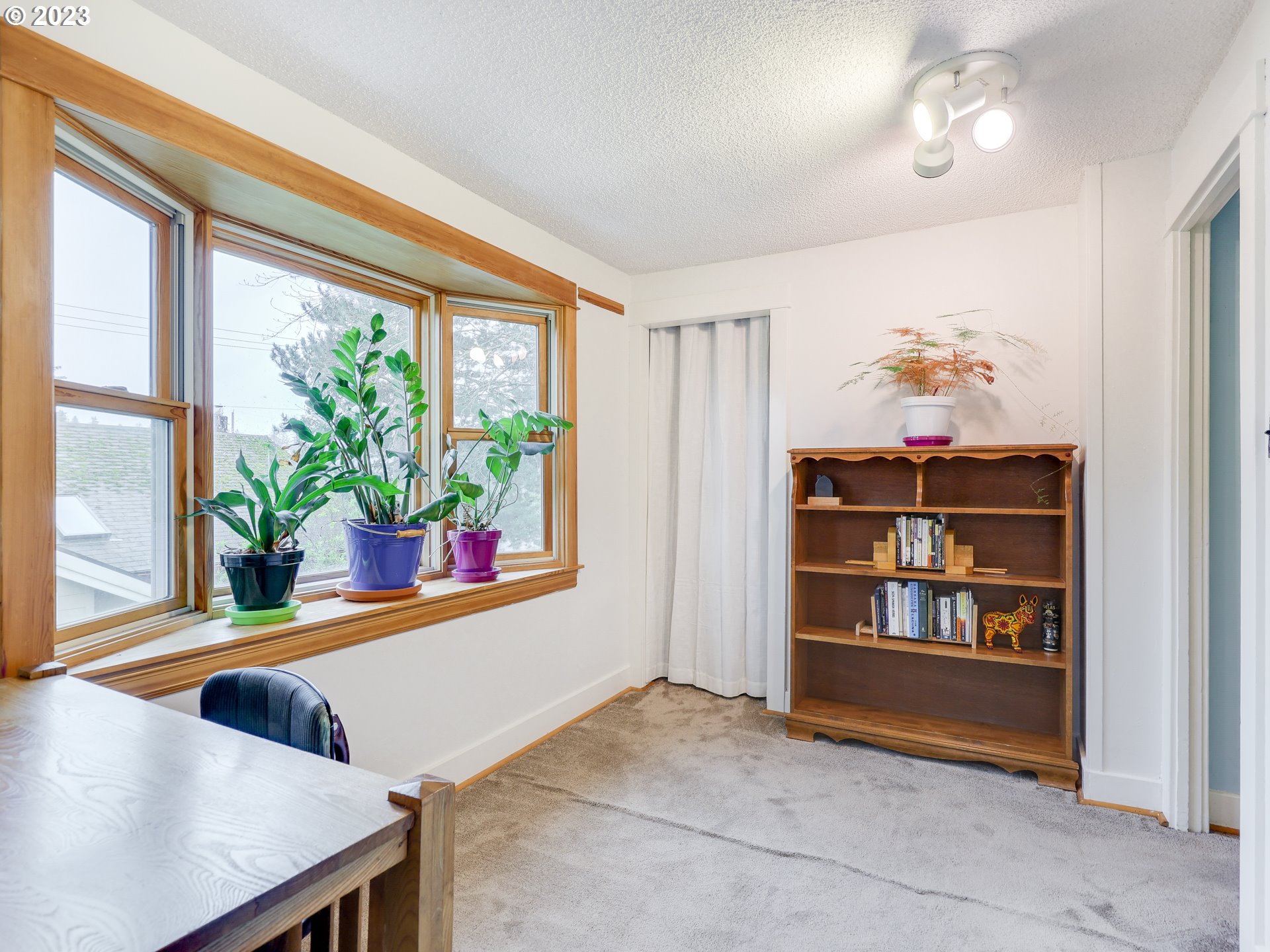 4936 Southeast 76th Avenue Portland, OR 97206 - Photo 22 of 47 a view of livingroom with furniture and cabinet