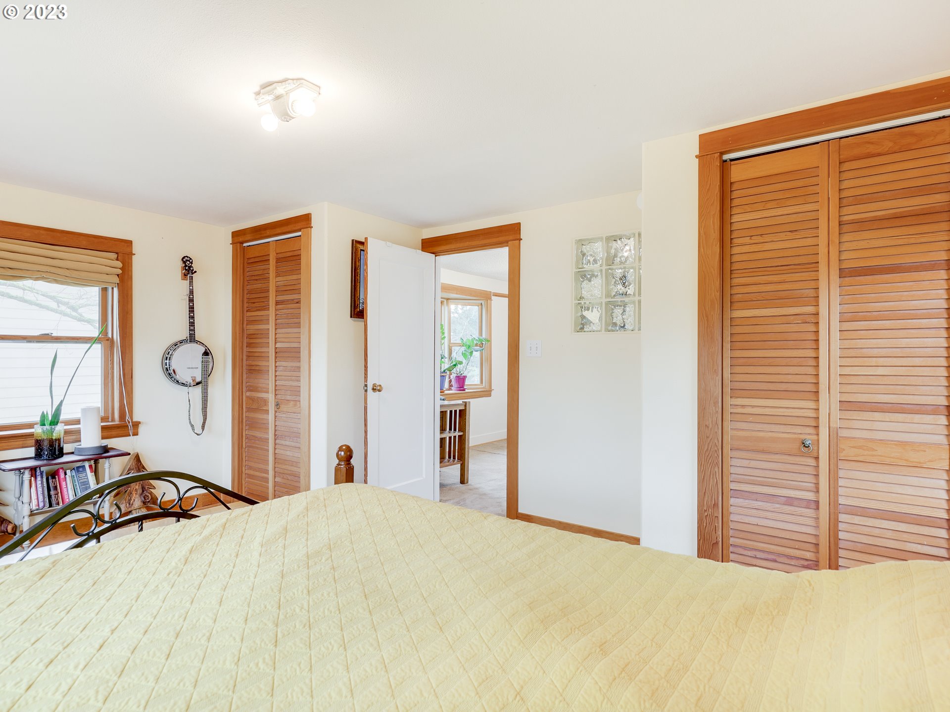 4936 Southeast 76th Avenue Portland, OR 97206 - Photo 26 of 47 a bed room with a bed and dresser