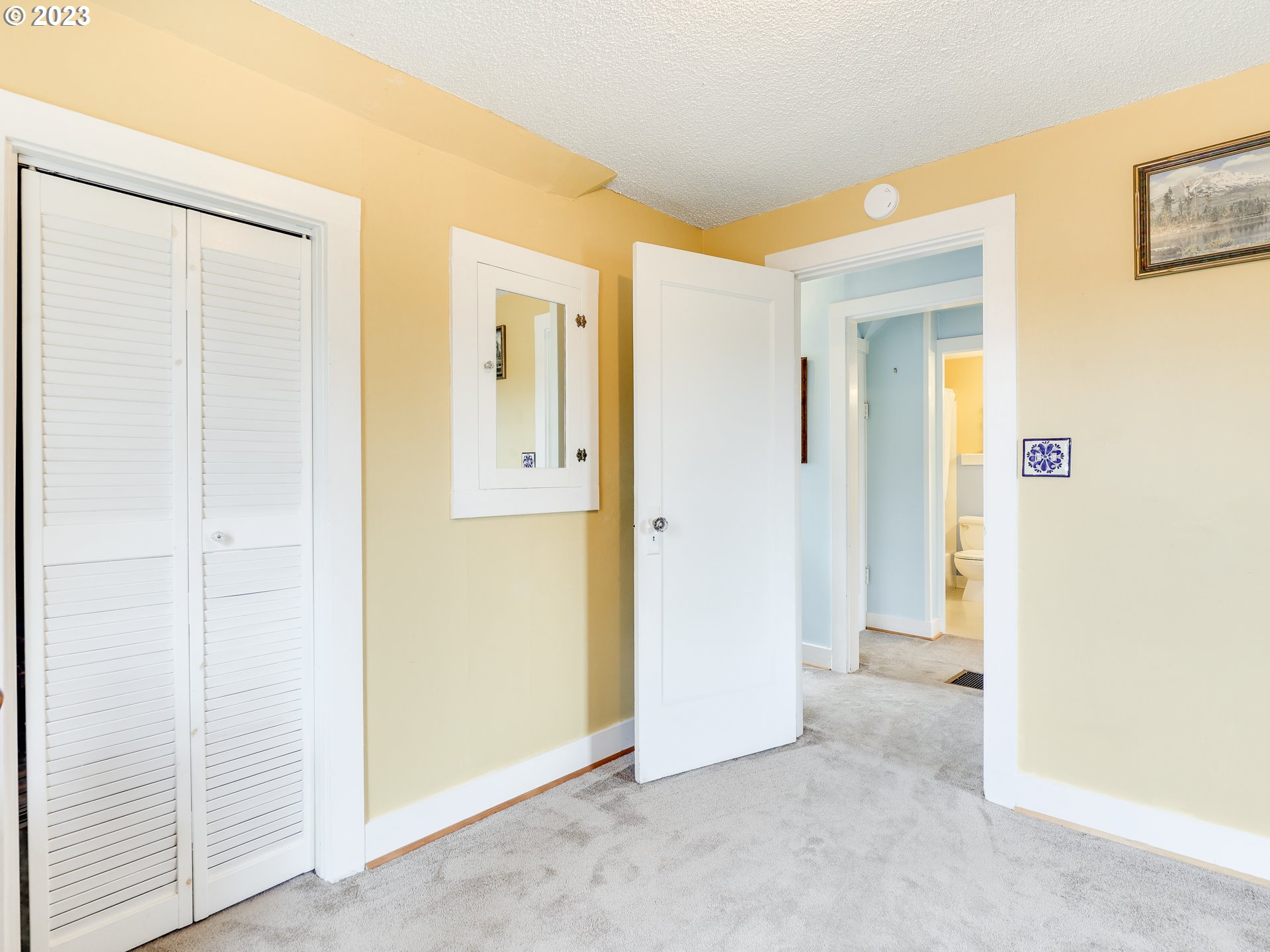 4936 Southeast 76th Avenue Portland, OR 97206 - Photo 29 of 47 a view of a hallway with wooden floor