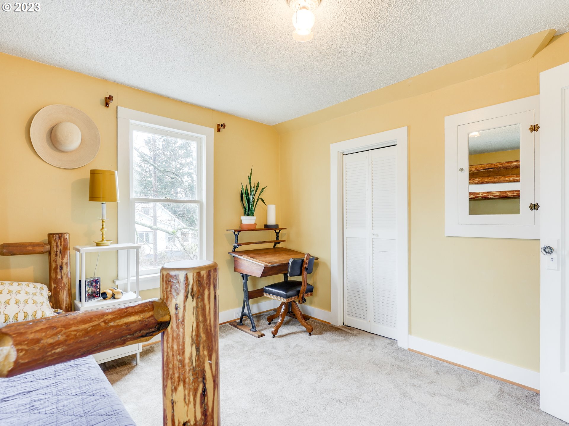 4936 Southeast 76th Avenue Portland, OR 97206 - Photo 30 of 47 a view of a livingroom with furniture and a window