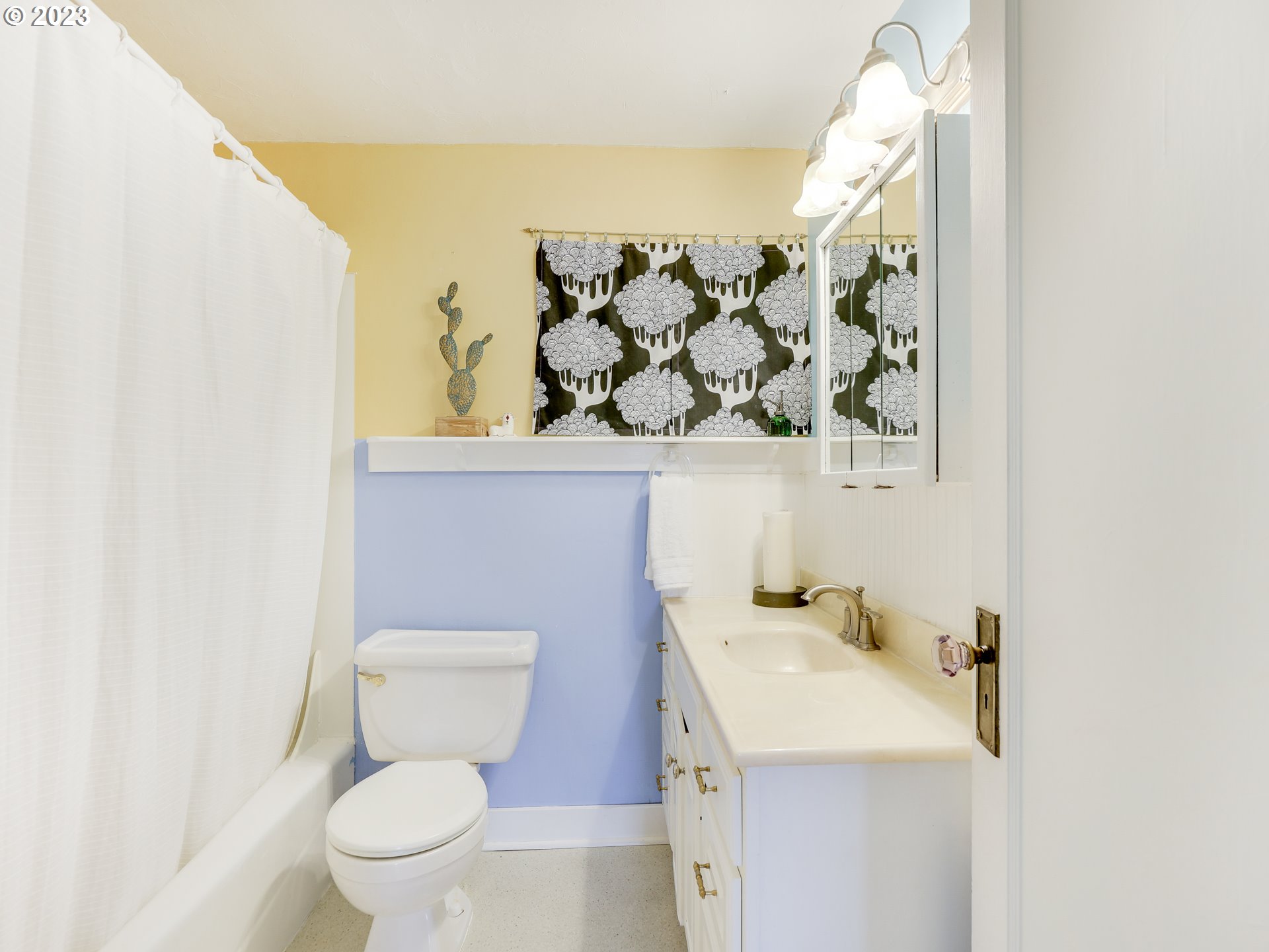 4936 Southeast 76th Avenue Portland, OR 97206 - Photo 32 of 47 a bathroom with a toilet sink and mirror